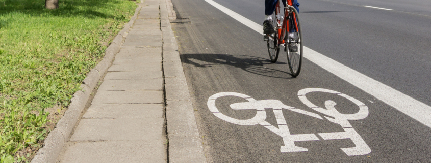 Bicycle path, cyclist, traffic lane - Red, white road marking