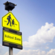 school zone label on blue sky background
