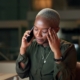 Night, business woman and frustrated with phone call, planning and brainstorming with overtime. Black person, employee and accountant with negotiation, stress and project proposal consulting deadline